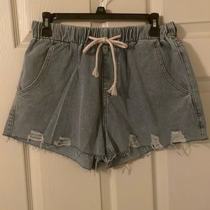 Misslook XL elastic wasted cutoff distressed denim shorts.
